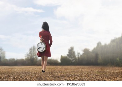 Surreal Moment Of A Woman Who Is Walking Towards Her Destiny With The Weight Of Time Passing 