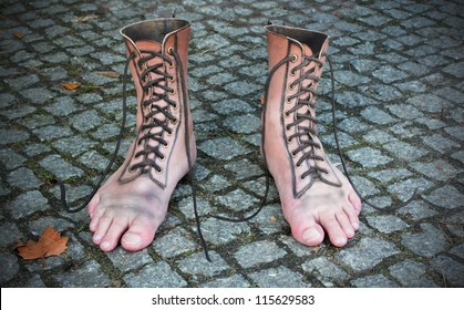 surreal photomontage of shoe and foot