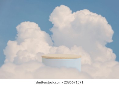 Surreal podium outdoor on blue sky soft white clouds with space.Beauty cosmetic product placement pedestal present stand minimal display,summer paradise dreamy concept.