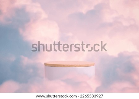 Surreal podium outdoor on blue sky pink gold pastel soft clouds with space.Beauty cosmetic product placement pedestal present promotion minimal display,summer paradise dreamy concept.