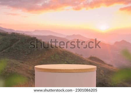 Surreal podium outdoors on sky golden pink pastel at sunset with mountain nature landscape background.Beauty cosmetic product placement pedestal present minimal display,summer paradise dreamy concept.