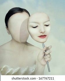 Surreal portrait of a woman faceless with her face mask 