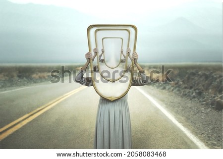 surreal reflection of a woman in a mirror
