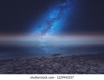 Surreal Sea At Night Landscape With Starry Sky. Dreamy Look.