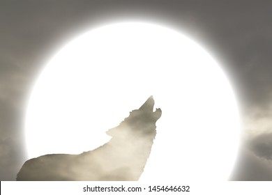 Surreal silhouette of a wolf howling against a full moon.  