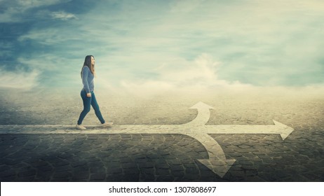 Surreal View As Woman Walking On A Line In Front Of A Crossroad Splitted In Three Different Ways As Road Arrows. Choosing The Correct Pathway Between Left, Right And Front. Difficult Decision Concept.