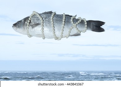 Surrealistic Isolated Fish Wearing A Pearl Necklace Floating In The Sky Above The Sea, Magritte Inspired