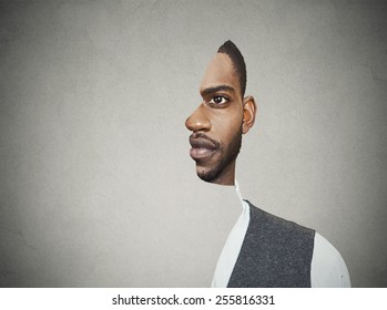 surrealistic portrait front with cut out profile of a young man isolated on grey wall background 