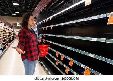 Surrey, British Columbia, Canada - March 18, 2020: Empty Shelves In A Supermarket During The Coronavirus Outbreak.