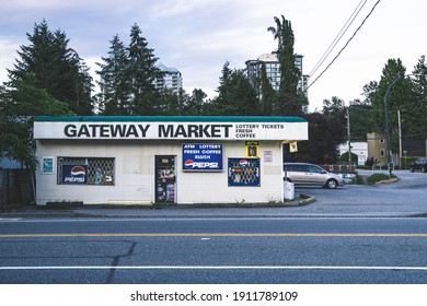 SURREY, CANADA - Jul 03, 2019: Gateway Market Corner Store In Surrey Whalley Area With Blue Sky In The Back And Trees Around The Building  Car Parked In Front Of Store 