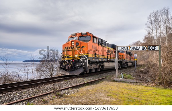 Surrey, Canada - Mar 29, 2020:\
BNSF freight train locomotive Southbound near Canada USA\
border