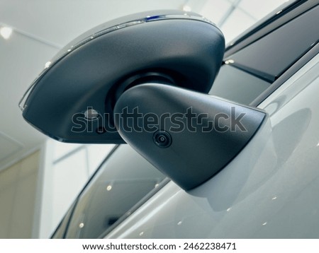 surround view camera system in modern car, camera lens underneath side mirror, blind spot camera system