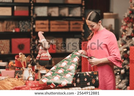 Similar – Image, Stock Photo Woman carefully cutting paper design in studio