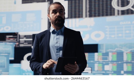 Surrounded by virtual graphs and forecasting models, chief executive officer uses financial data and insight to drive business growth. Ensuring performance and smart decision making. Camera A.