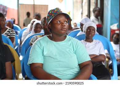 Surulere, Lagos Nigeria-May 27, 2022: A Teenage Girl Wearing A Bucket Cap In The Audience Listening To Teacher