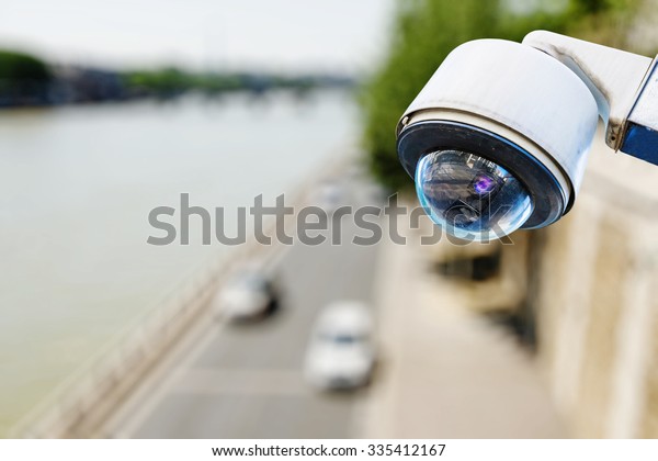 surveillance camera above a\
road