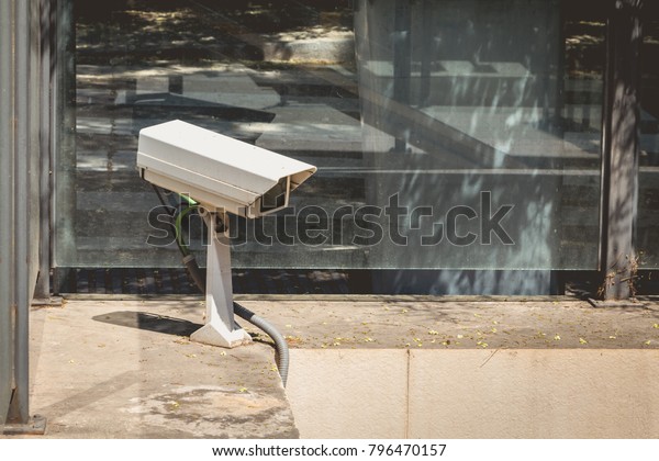 surveillance camera at the entrance of a car park
monitors the entrances and
exits