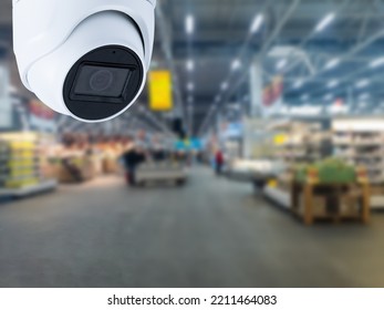 Surveillance Camera Shopping Department Store On The Background.