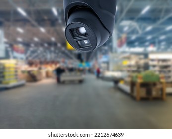 Surveillance Camera Shopping Department Store On The Background.