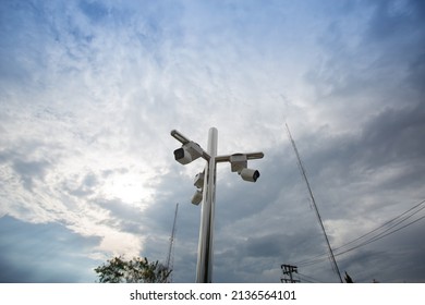 Surveillance Cameras Are Mounted On Stainless Steel Poles To Provide Security In Places Such As In The City. Is A Broad Perspective