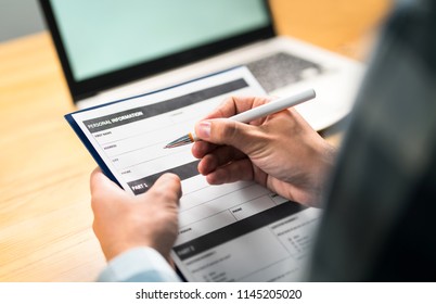 Survey, Agreement Or Application Paper. Man Writing Personal Information To Questionnaire, Contract Or Home Insurance Paper. Customer Or Employee Satisfaction Poll.