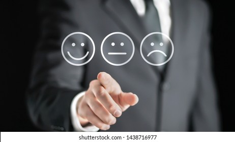 Survey, Giving Feedback, Poll Questionnaire And Customer Experience Concept. Business Man Push Digital Touch Screen To Tell Positive Opinion, Rating Or Review. Abstract Smiley Face Technology.
