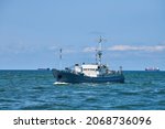 Survey vessel, research vessel patrol boat sailing in bright blue Baltic Sea, navy patrol vessel. Military ship, warship, battleship of Baltic Fleet, Russian Navy