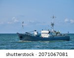 Survey vessel, research vessel patrol boat sailing in bright blue Baltic Sea, navy patrol vessel. Military ship, warship, battleship of Baltic Fleet, Russian Navy