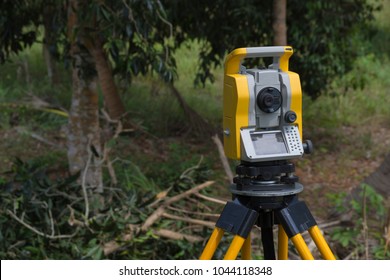 Surveying Instrument While Survey For Making New Road Across Forest