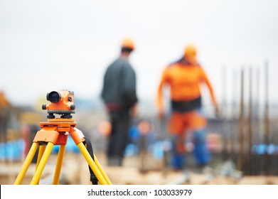 Surveying Measuring Equipment Level Transit On Tripod At Construction Building Area Site