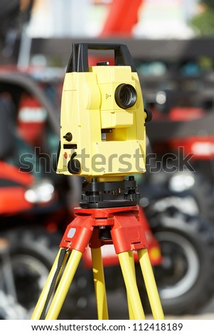 Surveying Measuring Equipment Level Transit Theodolite Stock Photo - surv!   eying measuring equipment level transit theodolite on tripod at constru!   ction building area site