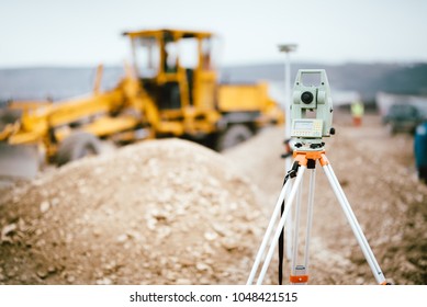 Surveyor equipment GPS system or theodolite outdoors at highway construction site. Surveyor engineering with total station 