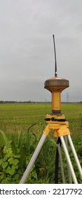 Surveyor Equipment With Paddy Fields. Data Collection With Topcon GPS GR-5 Equipment 