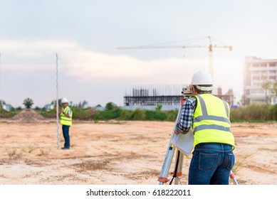 Surveyor equipment. Surveyor’s telescope at construction site or Surveying for making contour plans are a graphical representation of the lay of the land before startup construction work 