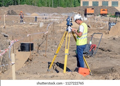 The Surveyor Performs Topographic Survey Of The Area For The Cadastre