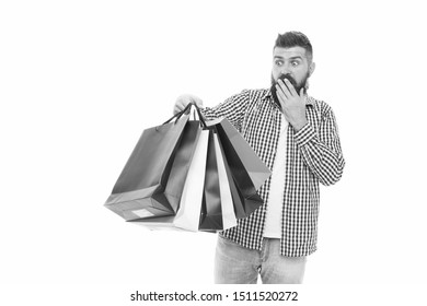 I Survived Black Friday. Surprised Hipster Holding Shopping Bags After Black Friday Isolated On White. Bearded Man Opening His Shopping Season On Black Friday. Offering Deep Discounts On Black Friday.