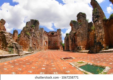 Survived walls. Ruins of monastery of San Francisco under blue sky with blue clouds in Santo Domingo, Dominican Republic