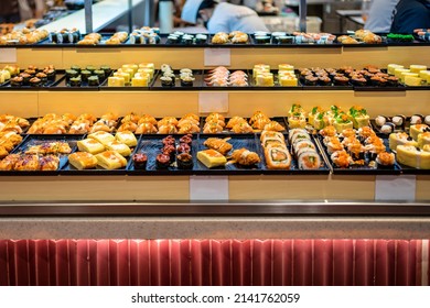 Sushi bar at restaurant. Sushi buffet, Japanese food that is loved by many nationalities and is healthy. 
