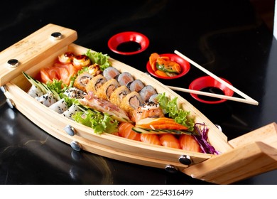 Sushi boat with nigiri sashimi  - Powered by Shutterstock