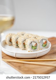 Sushi California With Sesame Seeds, Glass Of White Wine, Sushi Sticks, Soft Cheese