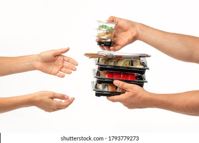 Sushi delivery concept, sushi in plastic container delivered to home