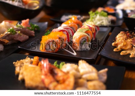 sushi maki rolls set in a variety of japanese food
