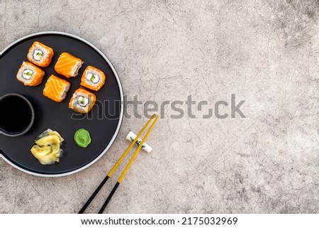 Sushi menu concept. Sushi roll set with salmon on dish