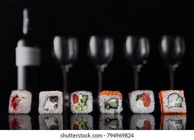 Sushi on a dark background.