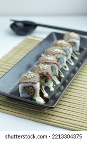 Sushi On A Long Plate With Various Kinds Of Toppings