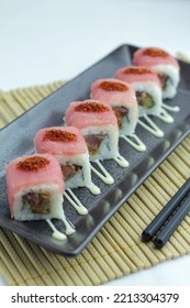 Sushi On A Long Plate With Various Kinds Of Toppings