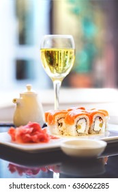 Sushi, a portion of Philadelphia sushi,philadelphia sushi tumblr,philadelphia roll. Ginger and a glass of wine. Japanese kitchen,Japanese cuisine,Japanese food. Japanese restaurant