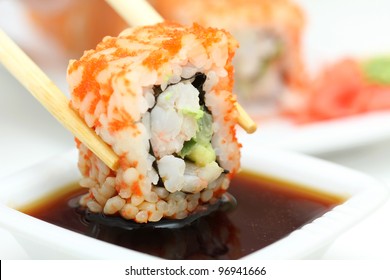 Sushi roll on white plate, closeup - Powered by Shutterstock