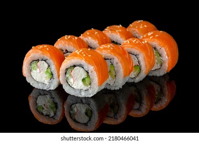 Sushi roll (Philadelphia) with salmon, prawn, avocado, cream cheese on black background. Sushi menu. Japanese food. - Powered by Shutterstock