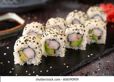 Sushi roll sushi with prawn, avocado, cream cheese, sesame. Sushi menu. Japanese food. 